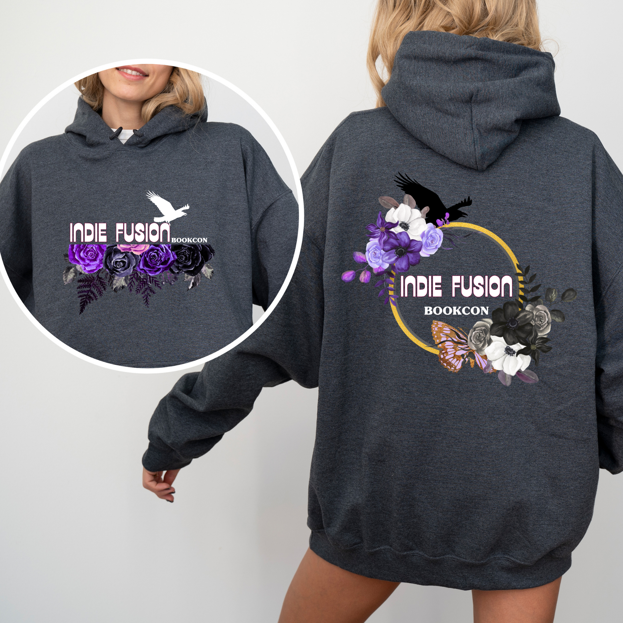 a woman wearing a grey hoodie showcasing the front and back with Indie Fusion bookcon logos on both sides. They include purple flowers and birds