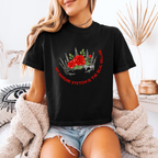 A woman wearing a black boxy crop shirt that has a crown and reads "My immune system is the real villain" 