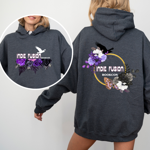 a woman wearing a grey hoodie showcasing the front and back with Indie Fusion bookcon logos on both sides. They include purple flowers and birds