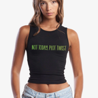 a woman wearing a black sleeveless crop that reads "not today, plot twist" in yellow and lime